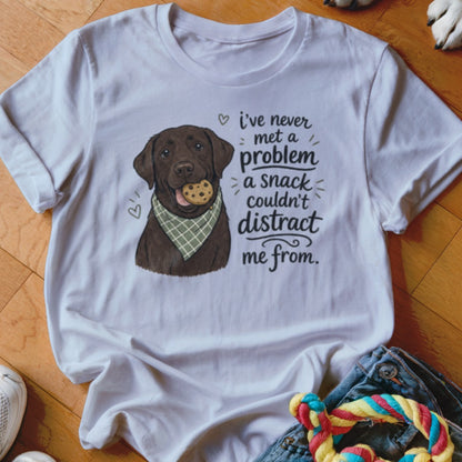 White t-shirt with chocolate lab graphic and text: "i've never met a problem a snack couldn't distract me from."