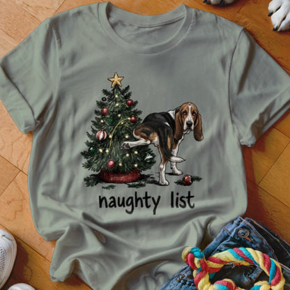 Basset hound near a Christmas tree with text "naughty list".
