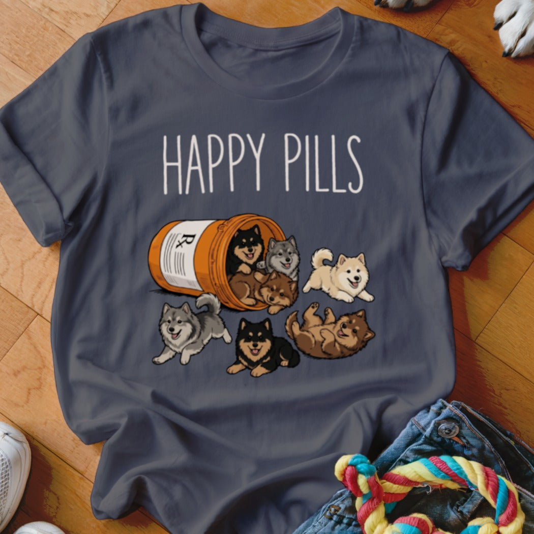 Dark t-shirt with "HAPPY PILLS" text and illustration of puppies spilling from a pill bottle.
