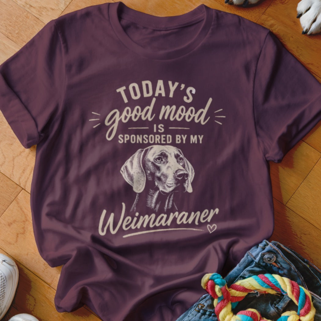 Maroon t-shirt with "Today's good mood is sponsored by my Weimaraner" text and dog illustration.