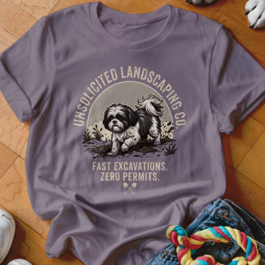 T-shirt graphic of a Shih Tzu digging in dirt with text "Unsolicited Landscaping Co." and "Fast Excavations. Zero Permits."