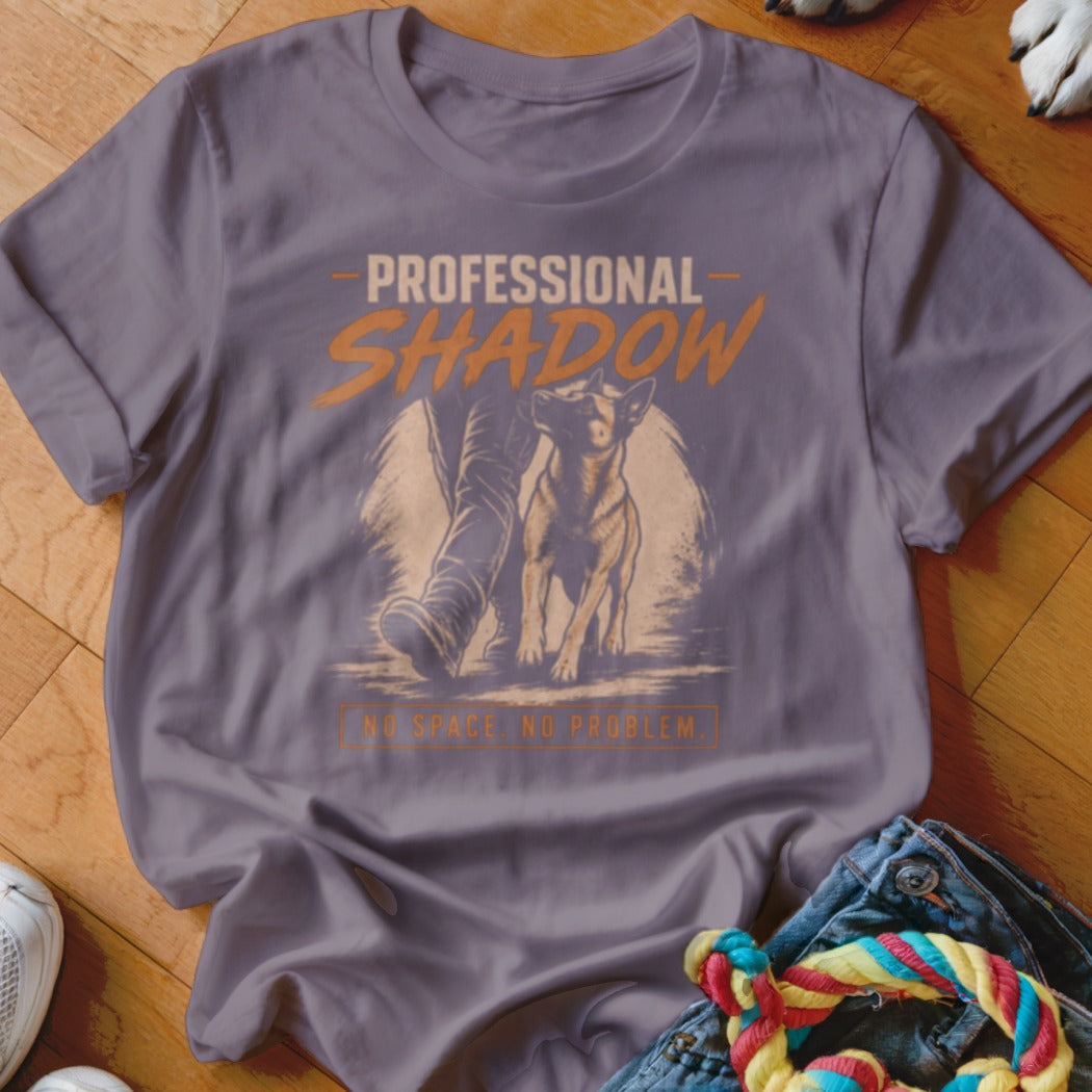 T-shirt with graphic of dog and person, text "PROFESSIONAL SHADOW NO SPACE NO PROBLEM".