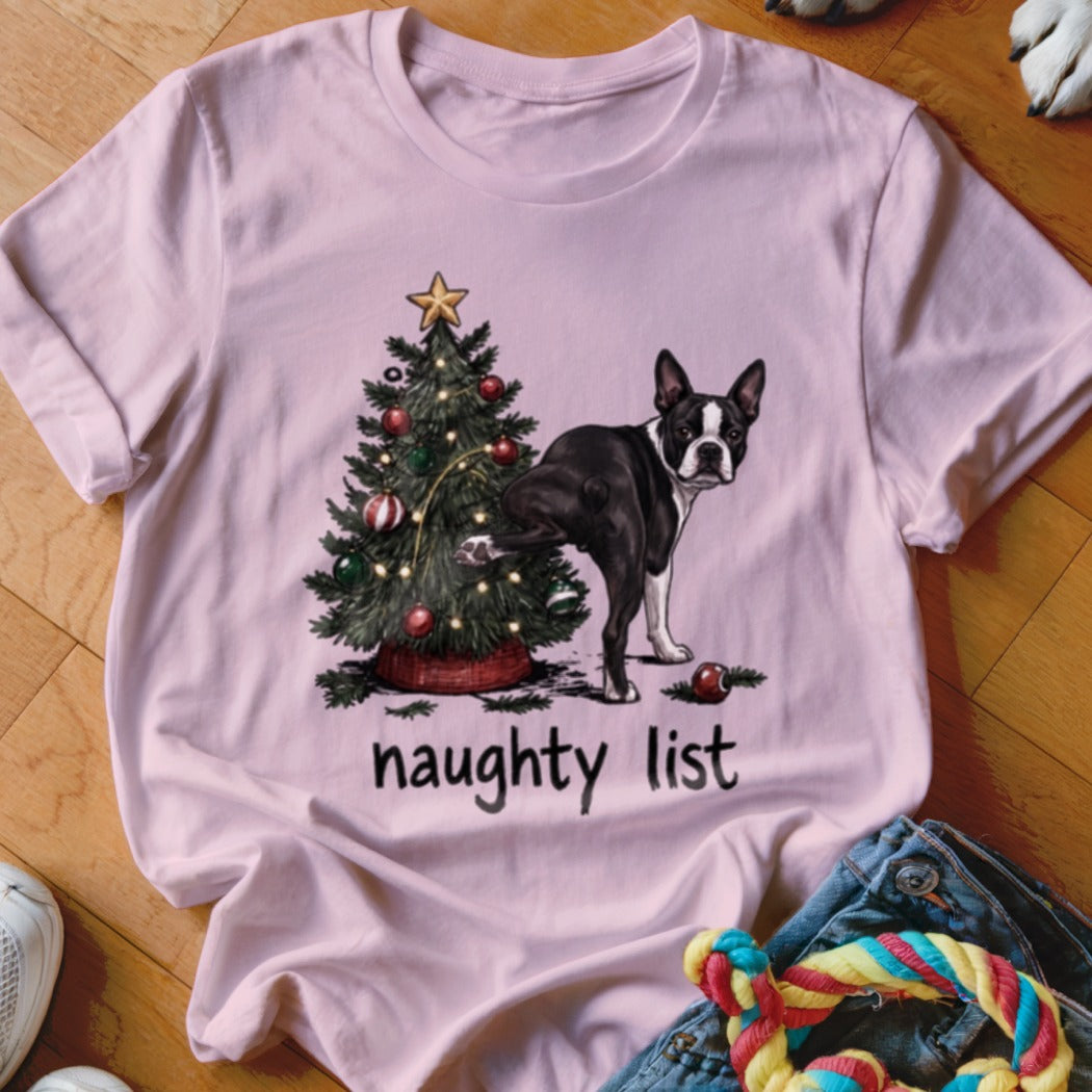 Pink t-shirt with a Boston Terrier near a Christmas tree and the words "naughty list".