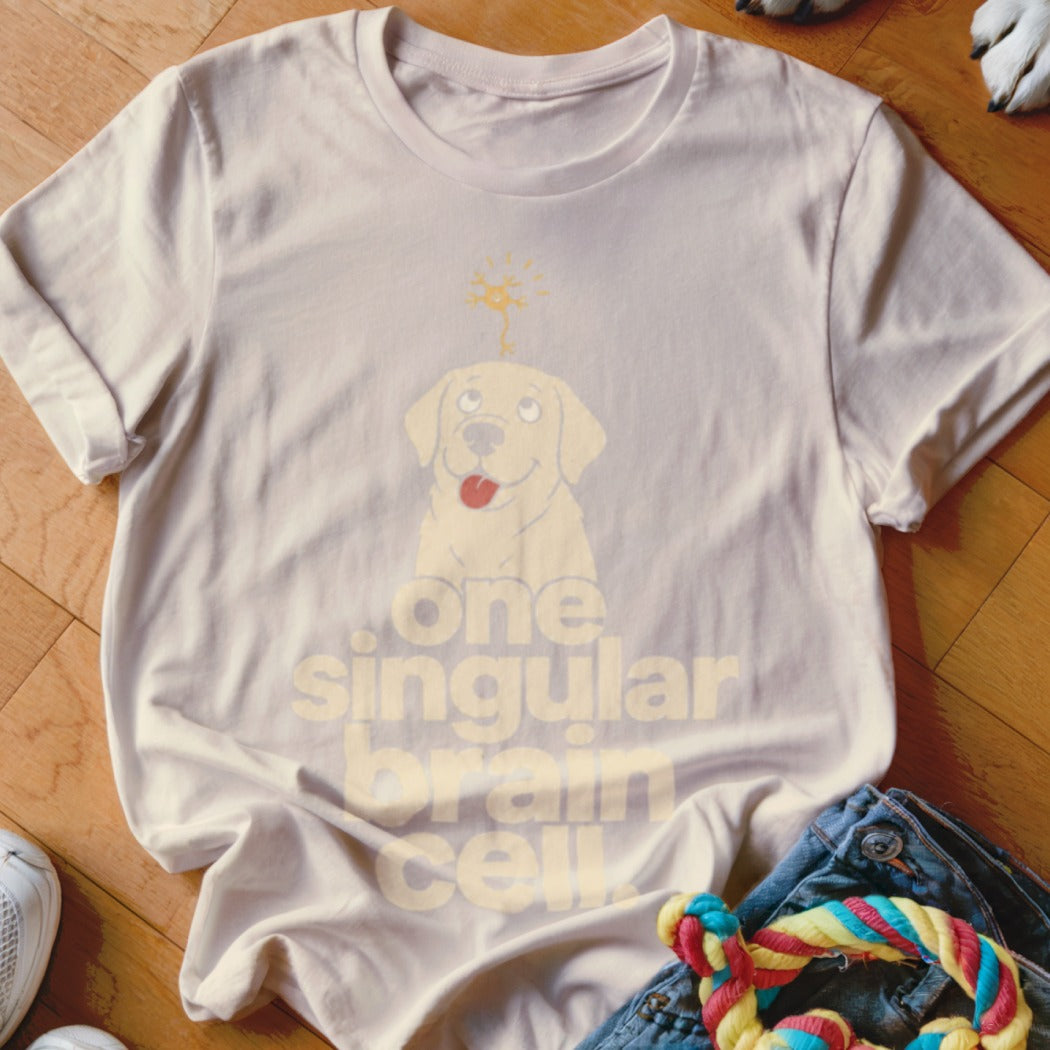 Cream t-shirt with yellow graphic of a dog and text "one singular brain cell."