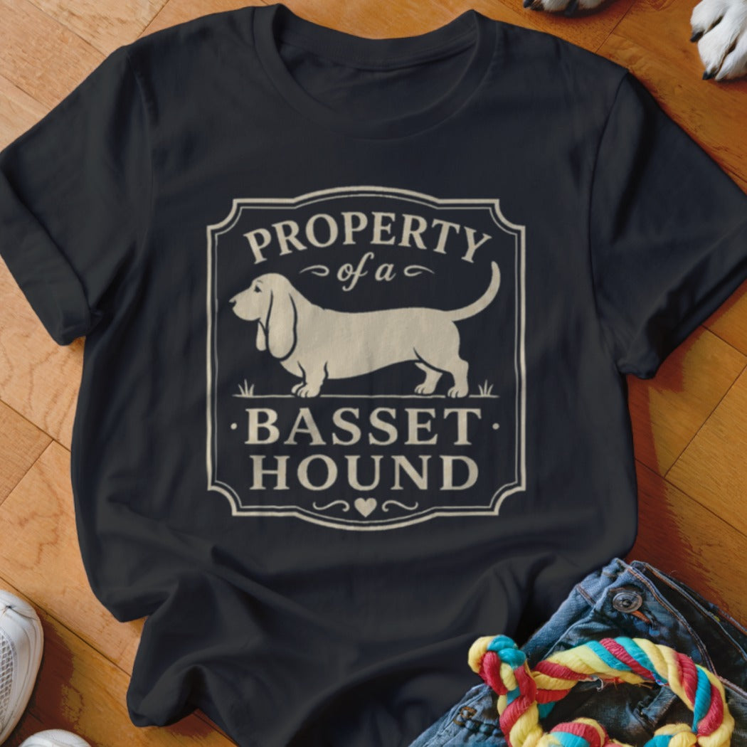 Black t-shirt with "Property of a Basset Hound" text and dog graphic.