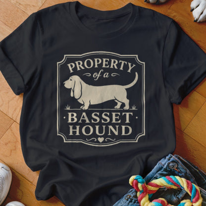Black t-shirt with "Property of a Basset Hound" text and dog graphic.