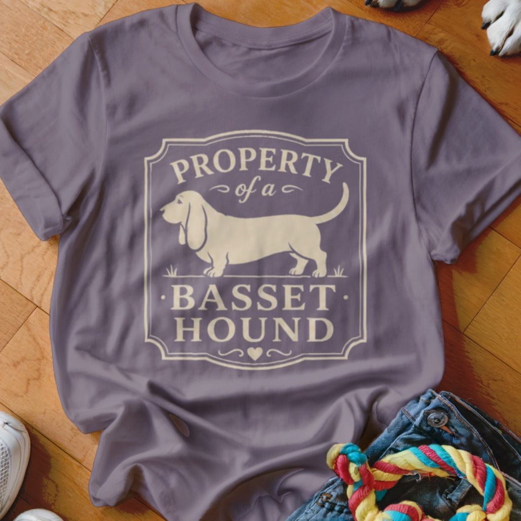 Purple t-shirt with "Property of a Basset Hound" text and a Basset Hound silhouette.