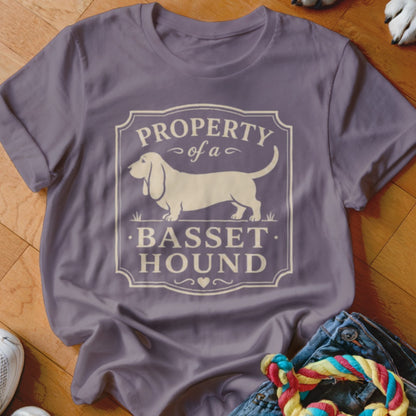 Purple t-shirt with "Property of a Basset Hound" text and a Basset Hound silhouette.