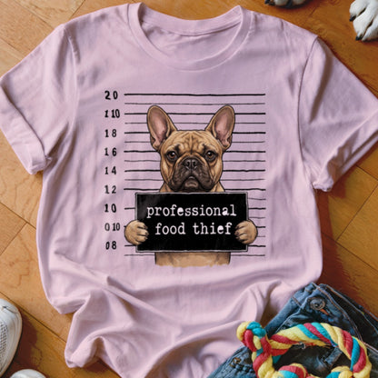 French bulldog mugshot with "professional food thief" sign and height markers.