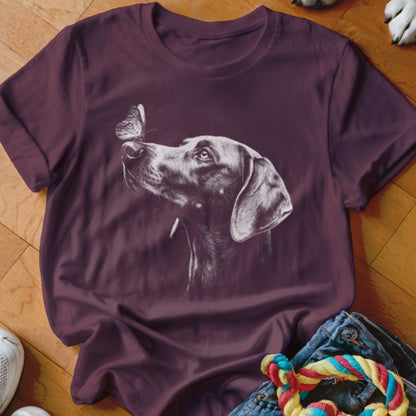 Maroon crewneck t-shirt featuring a white sketch graphic of a dog looking at a butterfly.