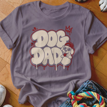 T-shirt with "DOG DAD" text in graffiti style, featuring a cartoon dog.