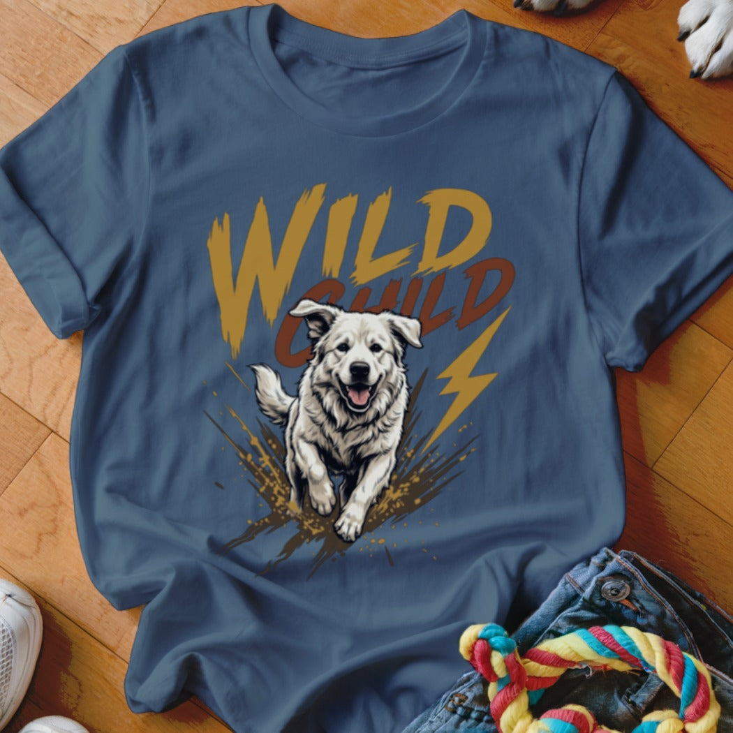 Blue t-shirt featuring a graphic of a happy white dog running through mud and the text Wild Child.