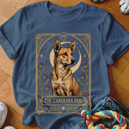 Blue t-shirt featuring a tarot card graphic of a Carolina Dog with floral and moon motifs.