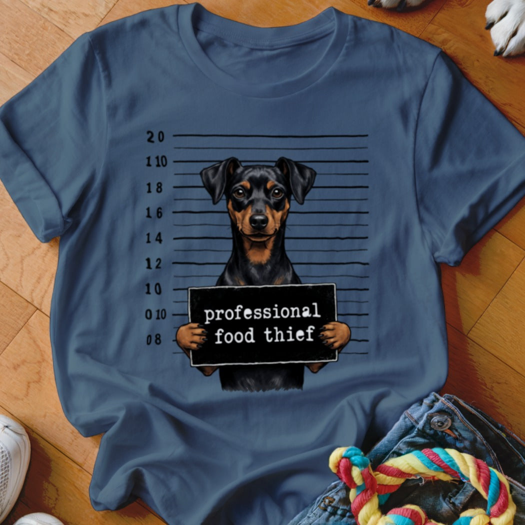 Dog mugshot with "professional food thief" sign against a height chart.