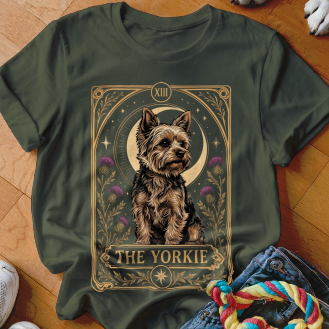 Olive green t-shirt featuring a tarot card graphic of a Yorkshire Terrier with thistles and the text The Yorkie.