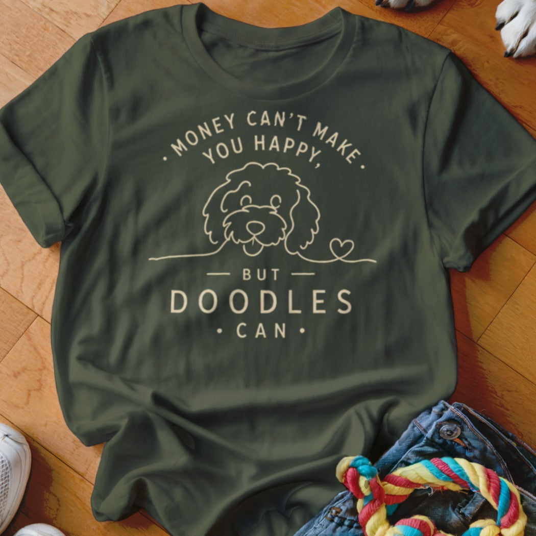 Green t-shirt with line drawing of a doodle dog and text "Money can't make you happy, but doodles can."