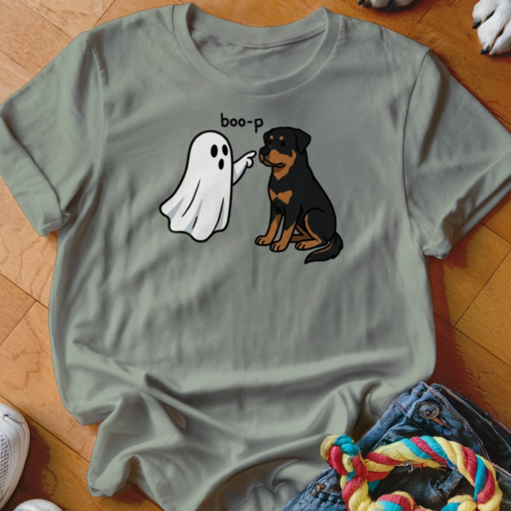 Ghost boo-ping a sitting Rottweiler dog on a grey t-shirt.