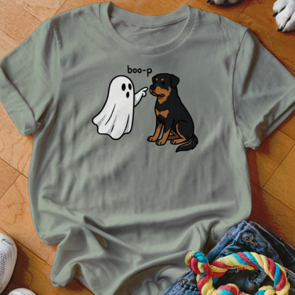 Ghost boo-ping a sitting Rottweiler dog on a grey t-shirt.