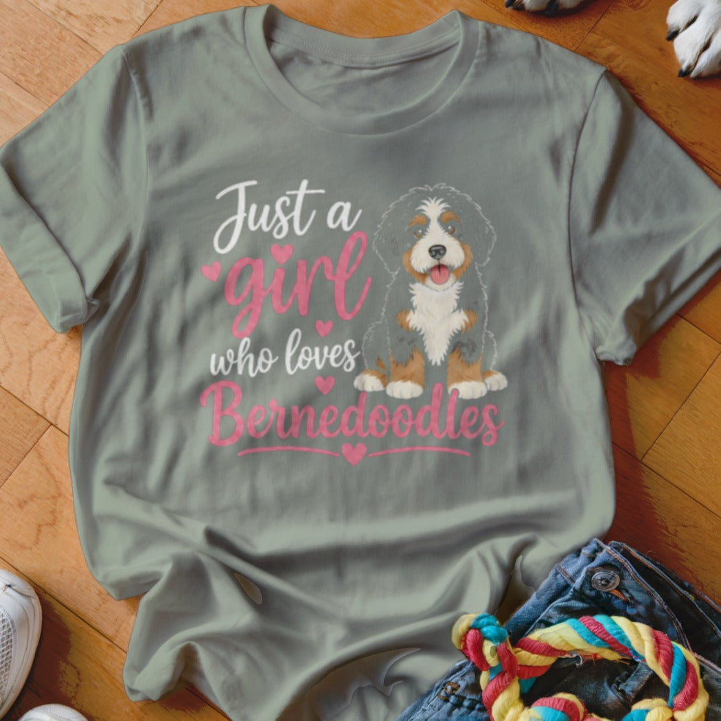T-shirt with illustration of Bernedoodle and text "Just a girl who loves Bernedoodles."