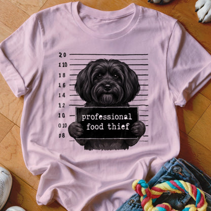T-shirt with black dog mugshot holding "professional food thief" sign