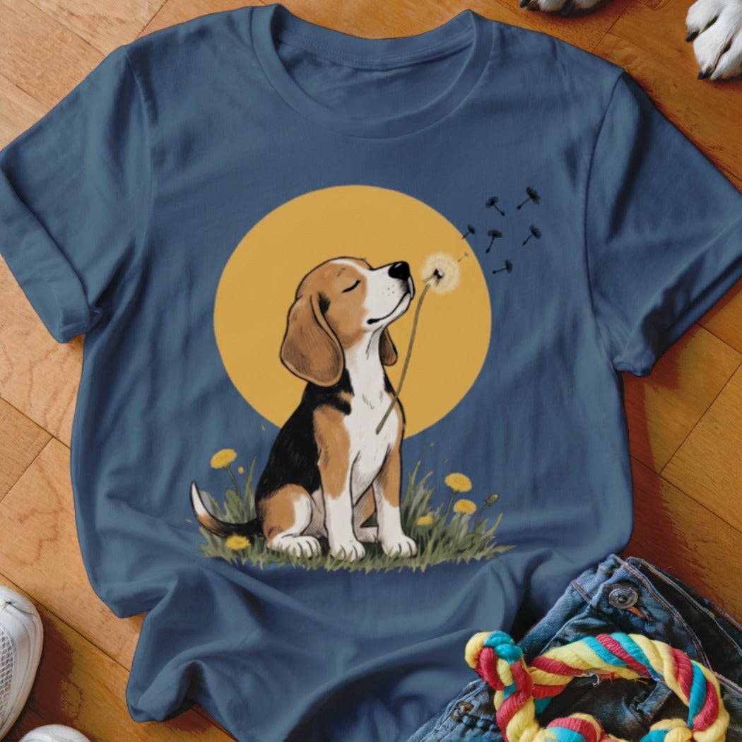 A dark blue crewneck t-shirt featuring an illustration of a beagle sniffing a dandelion.