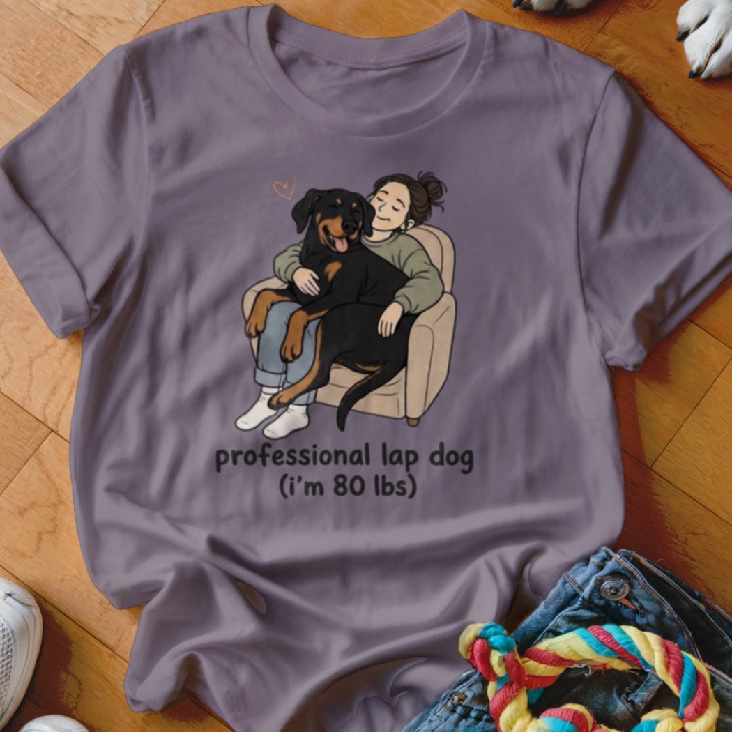 Illustration of a Rottweiler on a woman's lap, text "professional lap dog (i'm 80 lbs)".