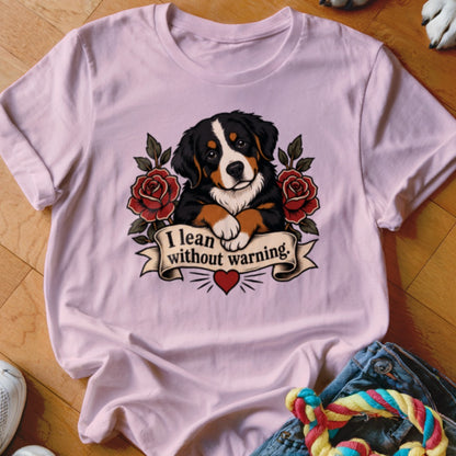 Bernese Mountain Dog puppy with roses and banner reading "I lean without warning."