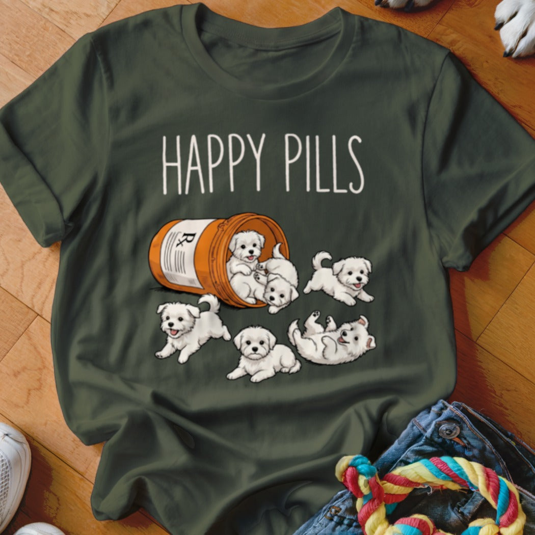 Green t-shirt with a prescription bottle spilling out fluffy white puppies and "HAPPY PILLS" text.