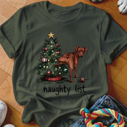 Brown dog lifting leg on Christmas tree with "naughty list" text.