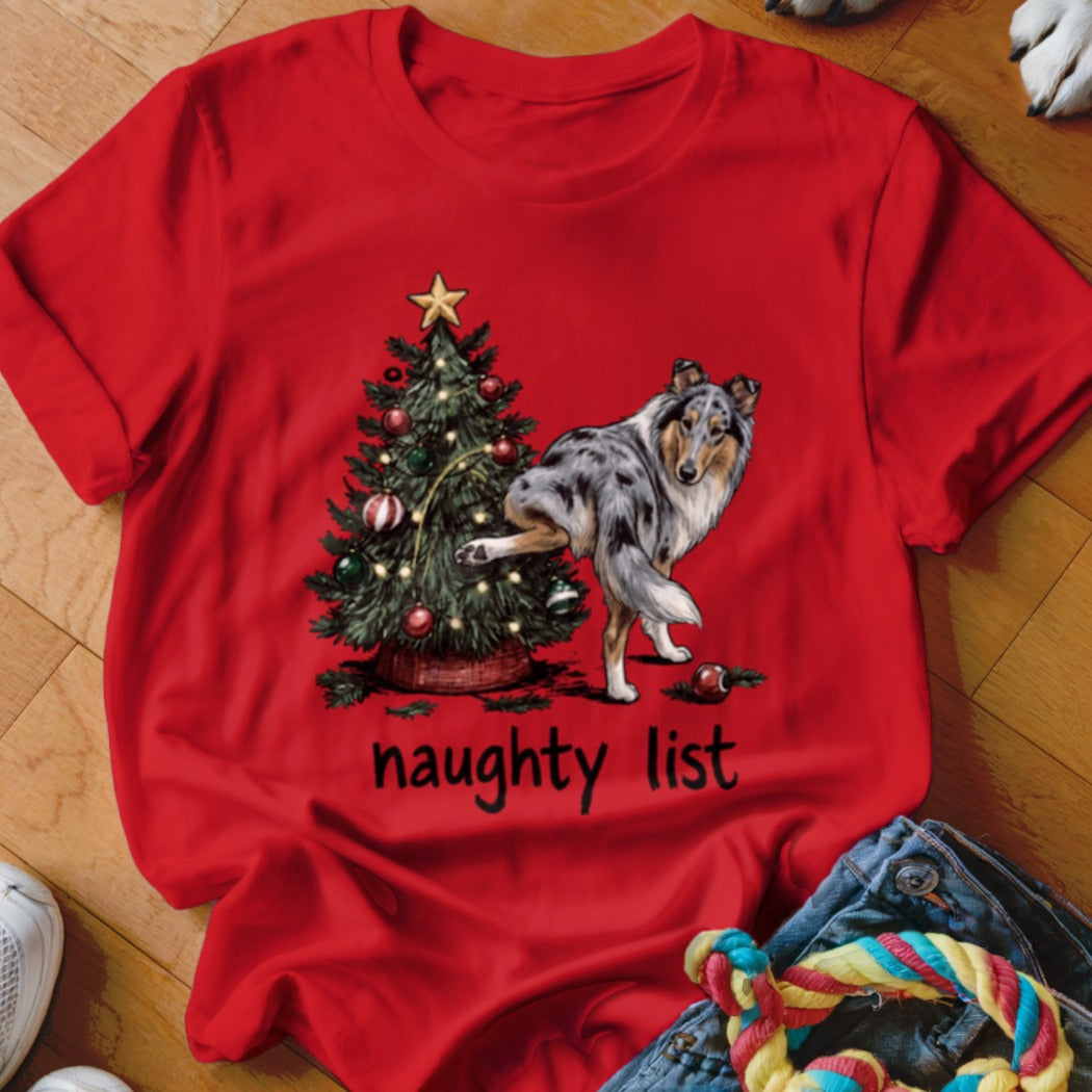 Red t-shirt with a dog and Christmas tree graphic and the words "naughty list".