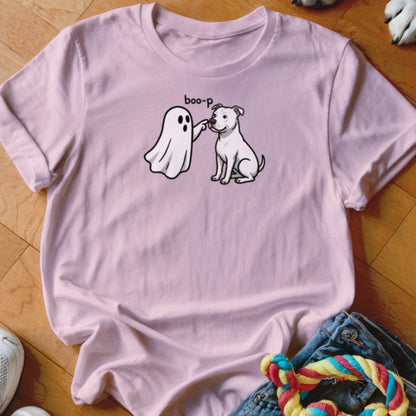 Pink t-shirt with a cartoon ghost saying "boo-p" to a sitting dog.
