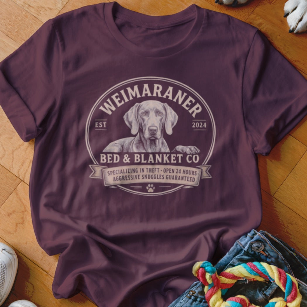 Weimaraner Bed & Blanket Co. t-shirt with dog graphic and humorous text.
