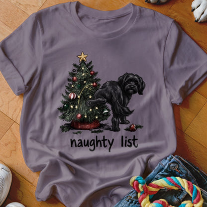 Black dog peeing on a Christmas tree with the text "naughty list".
