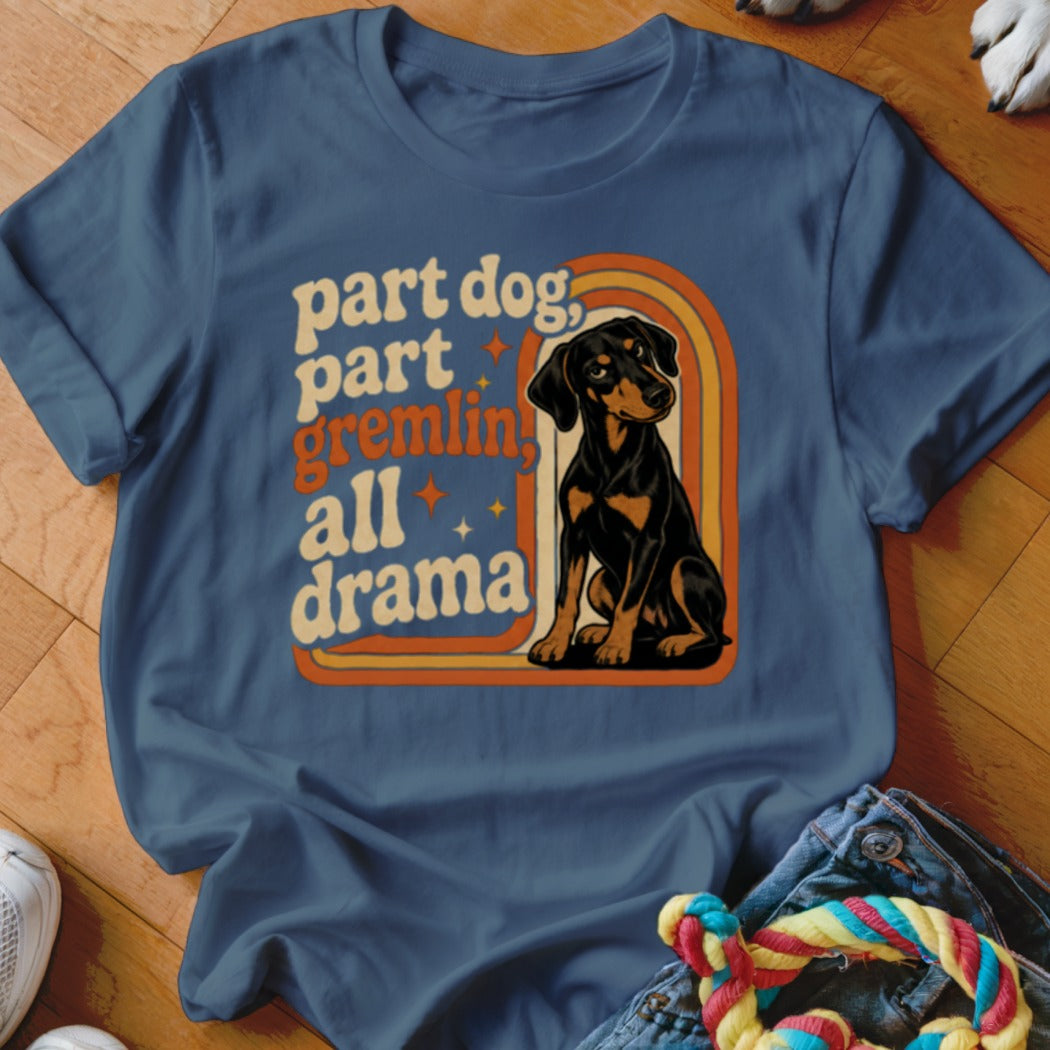 Blue t-shirt with text "part dog, part gremlin, all drama" and a dog graphic.