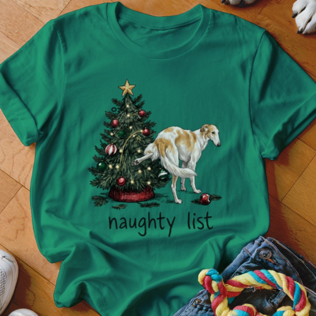 Green t-shirt featuring a Borzoi dog urinating on a Christmas tree with the text naughty list.