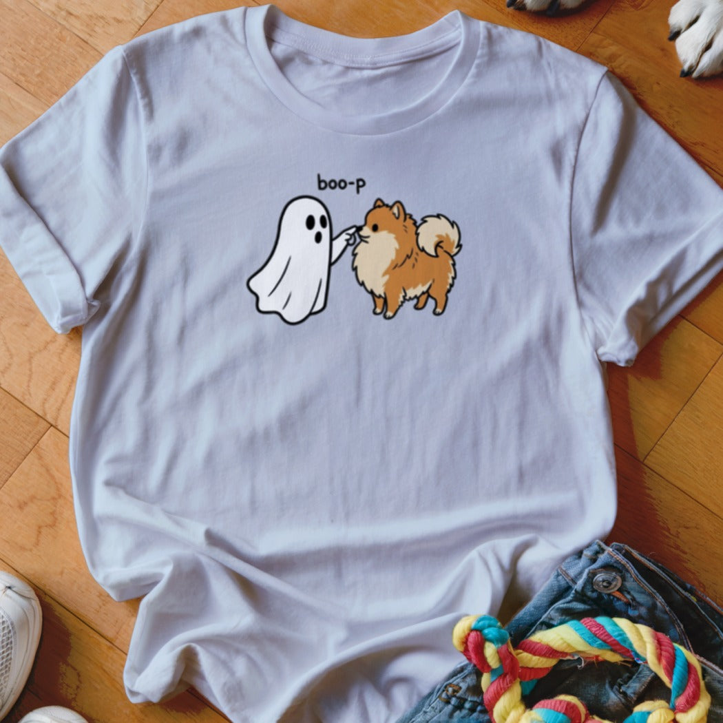 White t-shirt with a cartoon ghost booping a Pomeranian dog with "boo-p" text.
