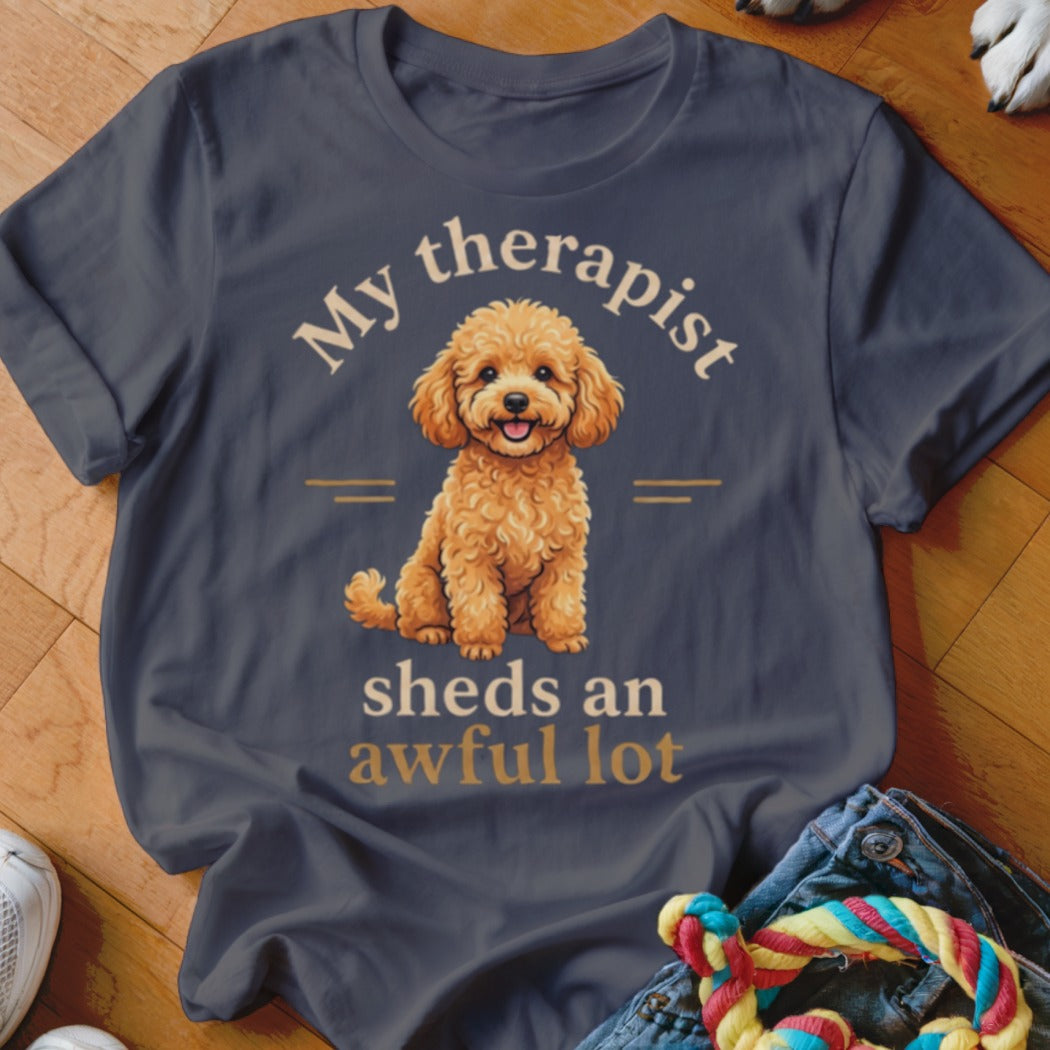 Dark grey t-shirt with a fluffy golden dog and text "My therapist sheds an awful lot".