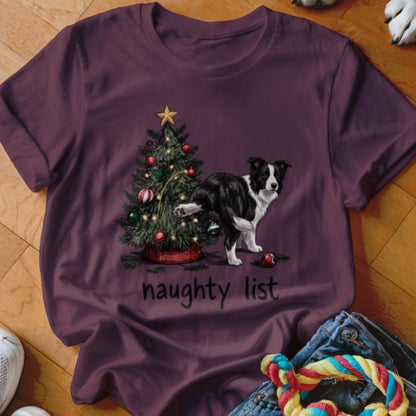 Border Collie next to a Christmas tree with the words "naughty list".