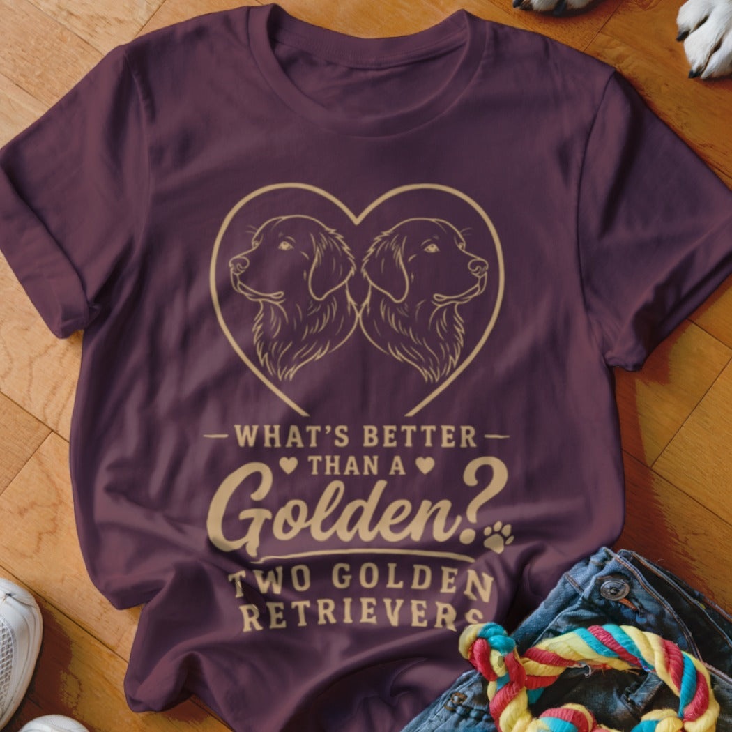 Maroon t-shirt with two golden retrievers inside a heart, text reads "WHAT'S BETTER THAN A Golden? TWO GOLDEN RETRIEVERS".