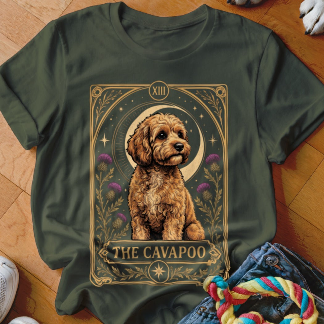 Dark green t-shirt featuring a tarot card graphic of a golden Cavapoo dog.