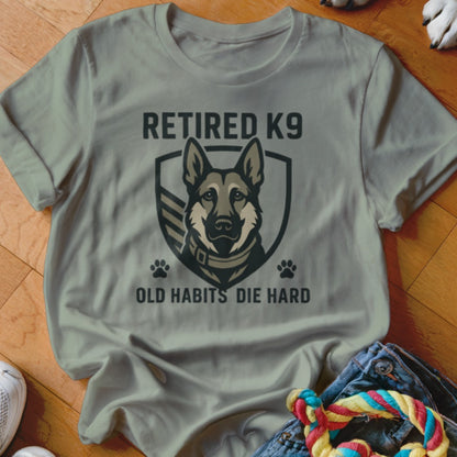 Gray t-shirt with "RETIRED K9 OLD HABITS DIE HARD" text and German Shepherd graphic.