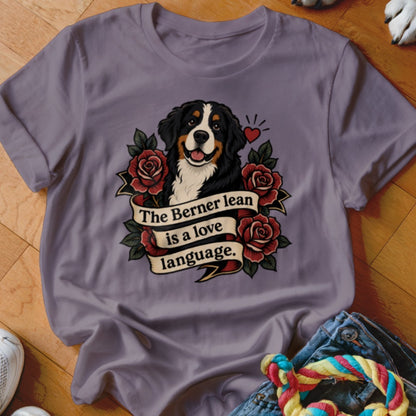 T-shirt graphic of a Bernese Mountain Dog with roses and the text "The Berner lean is a love language."