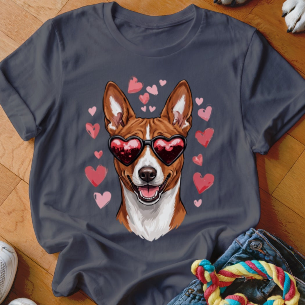A dark gray t-shirt featuring a graphic of a brown and white dog wearing heart-shaped sunglasses, surrounded by pink hearts.