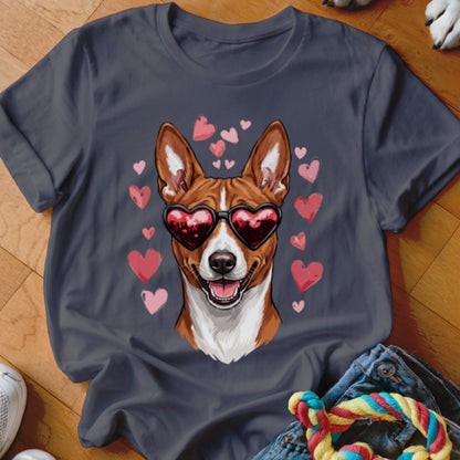 A dark gray t-shirt featuring a graphic of a brown and white dog wearing heart-shaped sunglasses, surrounded by pink hearts.