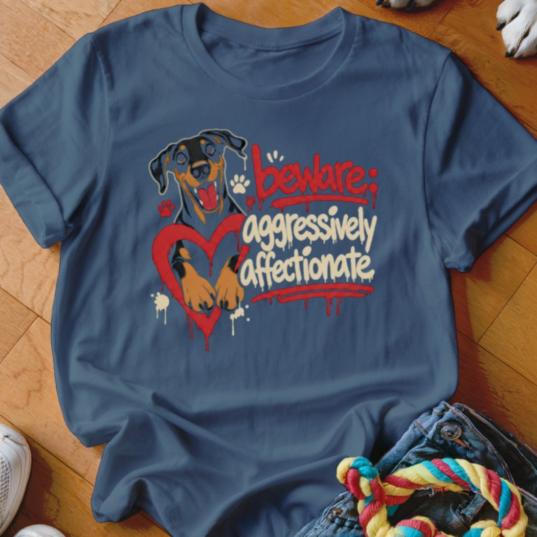 T-shirt with Doberman dog, red heart, and text "beware: aggressively affectionate".