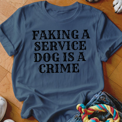 Blue t-shirt with black text: "Faking a service dog is a crime."
