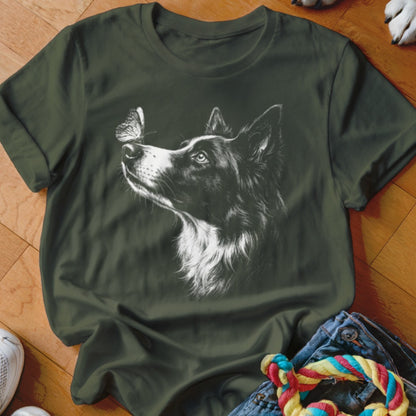 Dark green crewneck t-shirt featuring a white sketch of a border collie looking at a butterfly on its nose.