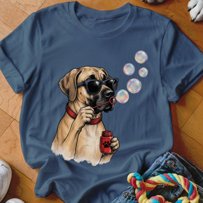 Blue t-shirt featuring an illustration of a dog wearing sunglasses and blowing soap bubbles.