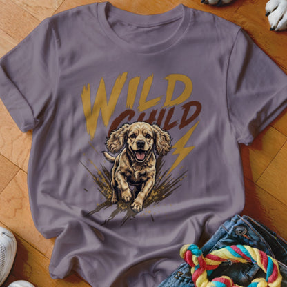 A grey t-shirt featuring a graphic of a golden puppy running through mud with the text "WILD CHILD".