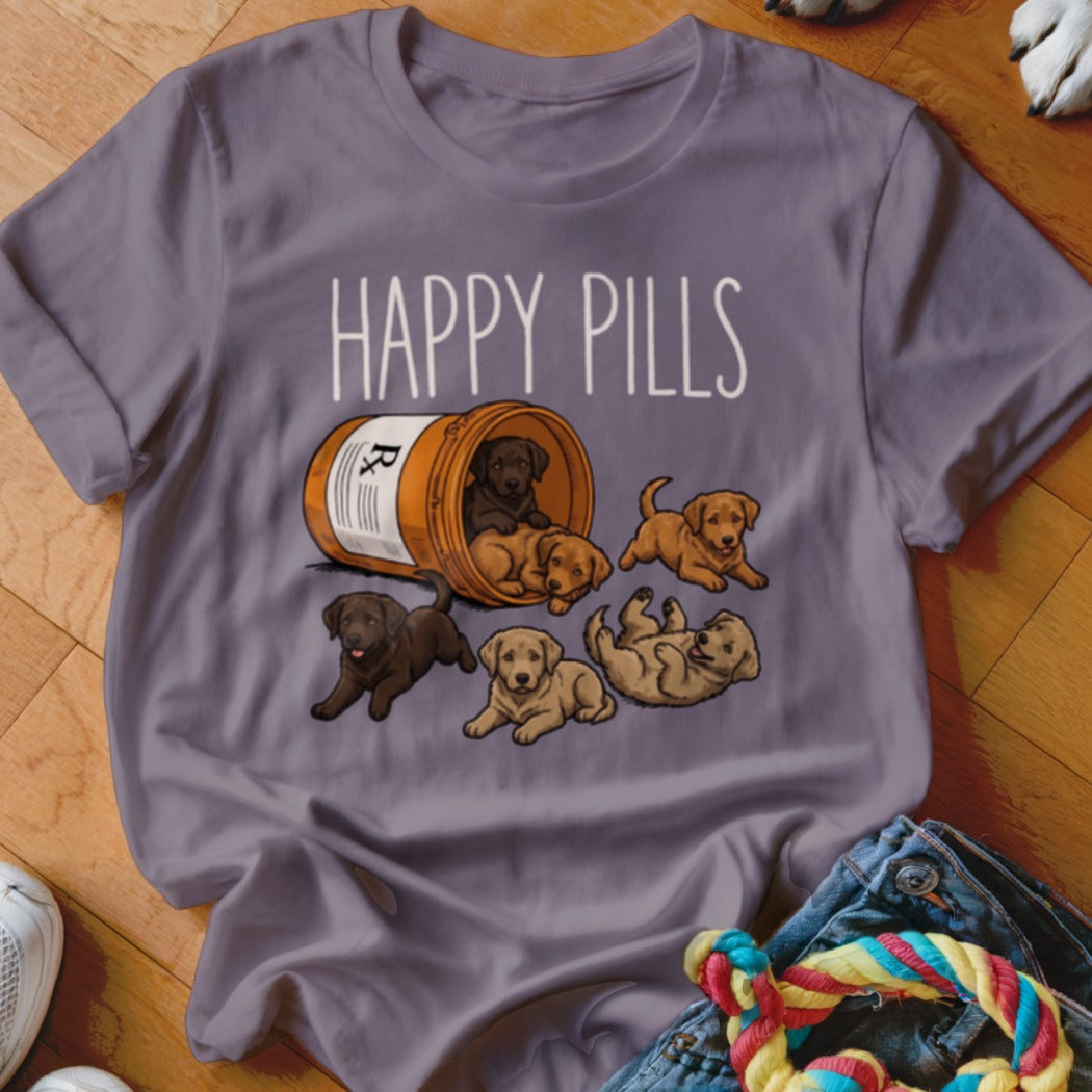 Several puppies spill from a prescription bottle with "HAPPY PILLS" text above.